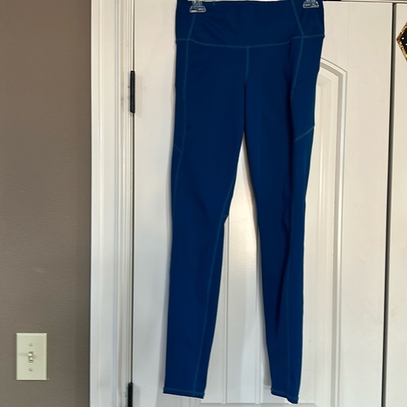 Athleta Pants - Athleta Teal Leggings Pockets Perforated 7/8 (Small)